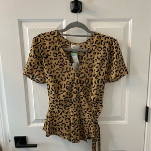 Leopard print wrap around blouse size Large.